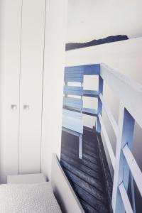 Postel nebo postele na pokoji v ubytování Nowe Apartamenty Puck