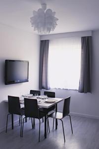 TV a/nebo společenská místnost v ubytování Nowe Apartamenty Puck