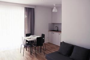 Kuchyň nebo kuchyňský kout v ubytování Nowe Apartamenty Puck