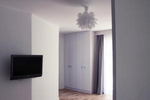 TV a/nebo společenská místnost v ubytování Nowe Apartamenty Puck