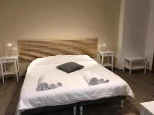 Ένα ή περισσότερα κρεβάτια σε δωμάτιο στο Villa Lò