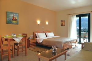 Voodi või voodid majutusasutuse Hotel Patelis toas