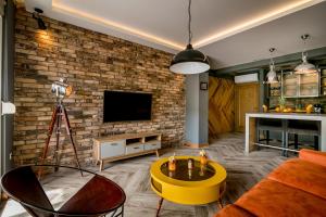 TV a/nebo společenská místnost v ubytování Apartments Magic Sea View