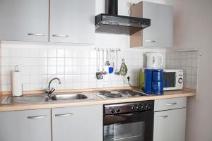 Küche/Küchenzeile in der Unterkunft Hotel Flosdorff - Appartements