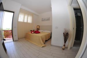 Postel nebo postele na pokoji v ubytování Hotel Antares