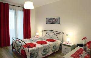 Postel nebo postele na pokoji v ubytování "Villetta Eromina"