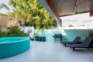 Bazén v ubytování Merida Serviced Apartments nebo v jeho okolí