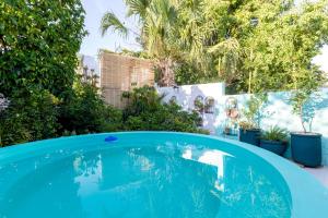 Bazén v ubytování Merida Serviced Apartments nebo v jeho okolí