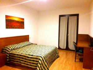Postel nebo postele na pokoji v ubytování Hotel Nicolaj