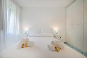 Ένα ή περισσότερα κρεβάτια σε δωμάτιο στο Il Poggetto
