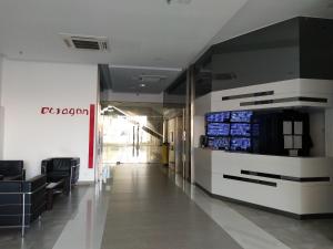 a lobby with a waiting room with a tv at The Octagon Ipoh in Ipoh +63 photos