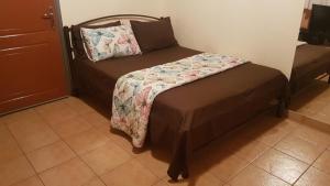 Voodi või voodid majutusasutuse Cozy Loft toas
