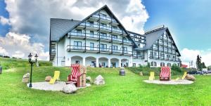 Foto da galeria de Alpina Lodge Hotel Oberwiesenthal em Kurort Oberwiesenthal