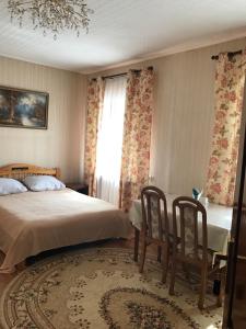 Postel nebo postele na pokoji v ubytování Гостиница Альянс