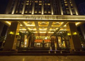 a building with a sign on the front of it at Chengdu Jin Yun Hotel in Chengdu