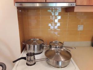 Кухня или мини-кухня в Dais Apartments
