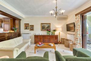 TV a/nebo společenská místnost v ubytování Casa Giardino