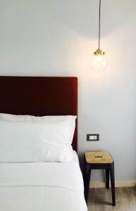 Postel nebo postele na pokoji v ubytování Benaco36
