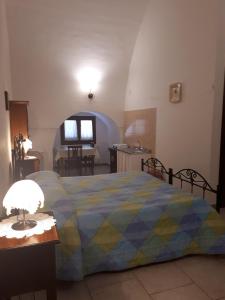 Postel nebo postele na pokoji v ubytování Masseria Cassiere