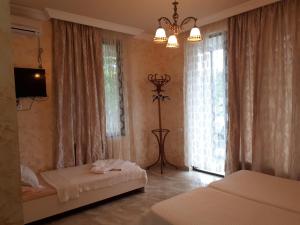 Postel nebo postele na pokoji v ubytování Apartment MaxinJauri