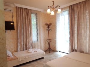 Postel nebo postele na pokoji v ubytování Apartment MaxinJauri