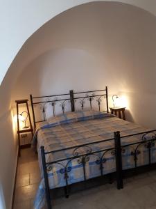 Postel nebo postele na pokoji v ubytování Masseria Cassiere