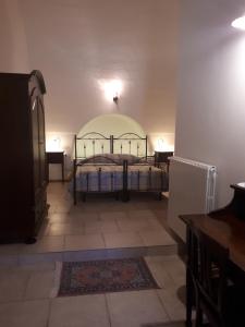 Postel nebo postele na pokoji v ubytování Masseria Cassiere