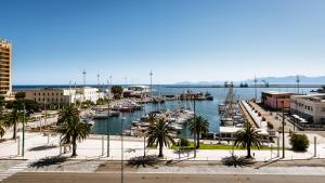 a view of a marina with boats in the water at Birkin Marina in Cagliari