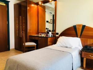 Postel nebo postele na pokoji v ubytování Ariae Dépendance - Alihotels