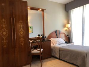 Postel nebo postele na pokoji v ubytování Ariae Dépendance - Alihotels