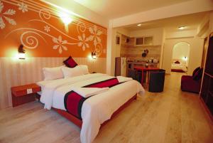 Rúm í herbergi á Hotel City Inn - Mountain View