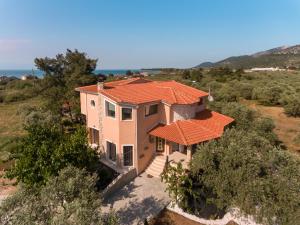an aerial view of a house with an orange roof at Fokas Luxury Villa in Prinos