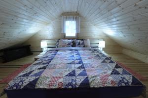 Katil atau katil-katil dalam bilik di Villa Pepeljuga kuća za odmor