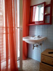 Koupelna v ubytování Atene Albergo Riccione