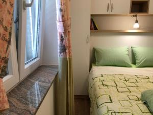 Ein Bett oder Betten in einem Zimmer der Unterkunft Apartments Galic