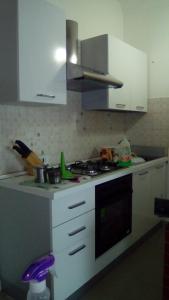 Virtuvė arba virtuvėlė apgyvendinimo įstaigoje Appartamento le Porte di Ortigia
