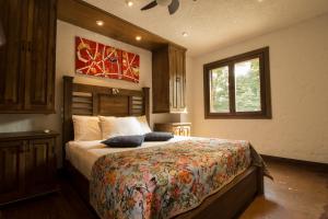 En eller flere senge i et værelse på Casa Del Reloj