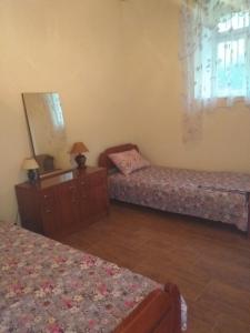 A bed or beds in a room at Apartman "Marko"