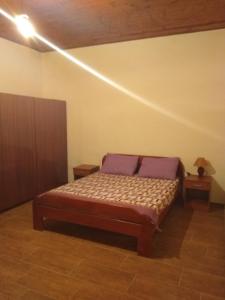 A bed or beds in a room at Apartman "Marko" Még 26 kép