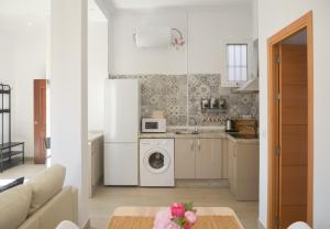 Virtuvė arba virtuvėlė apgyvendinimo įstaigoje Apartamento Faustino Alvarez