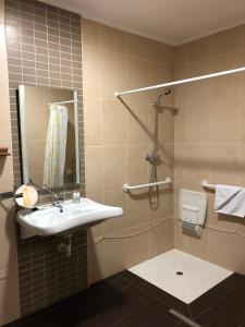 Koupelna v ubytování Hotel Paiva