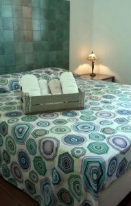 Кровать или кровати в номере Circeo Home La Mola