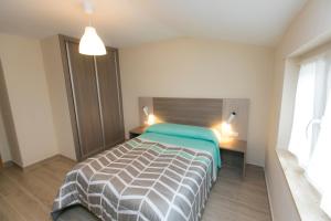 Ένα ή περισσότερα κρεβάτια σε δωμάτιο στο Casa Melva