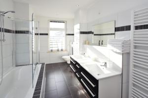Kylpyhuone majoituspaikassa Apartments-Leipzig
