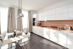 A kitchen or kitchenette at Apartments-Leipzig