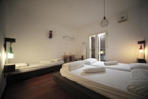 Кровать или кровати в номере Dopa Hostel