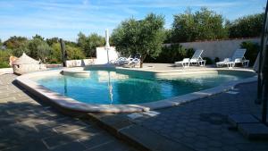 Bazén v ubytovaní Apartments Villa Oliva alebo v jeho blízkosti