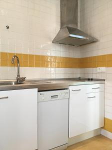 Kuchyň nebo kuchyňský kout v ubytování Vidrio Apartment