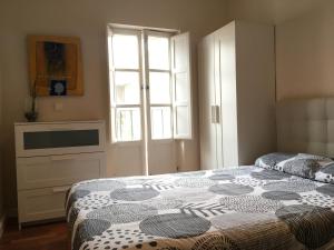 Postel nebo postele na pokoji v ubytování Vidrio Apartment