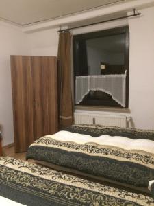 Postel nebo postele na pokoji v ubytování Abels Appartements
